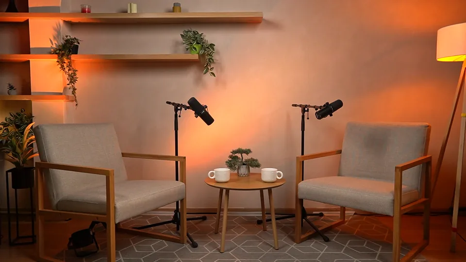 Light recording setup with two armchairs and microphones