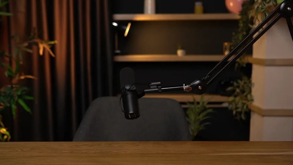 Single-speaker recording setup with microphone and table